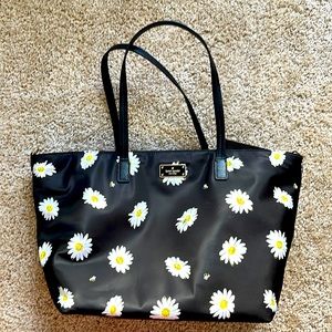 Kate Spade Daisy print diaper bag with changing mat.